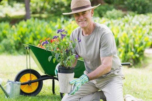 Professional landscaper working on a garden project